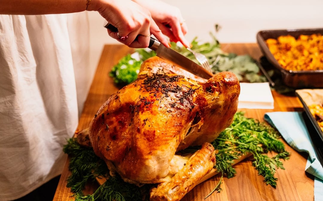 person-cutting-turkey